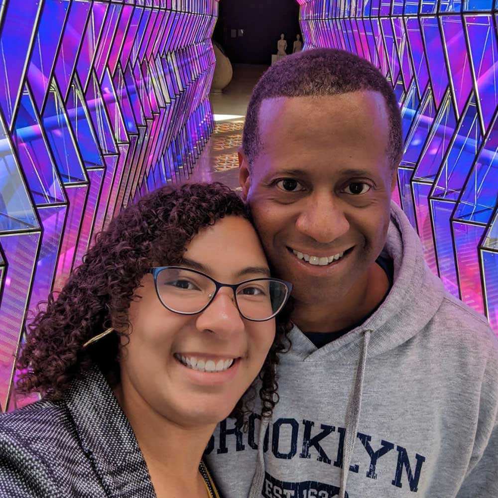 Man and woman smiling at the camera